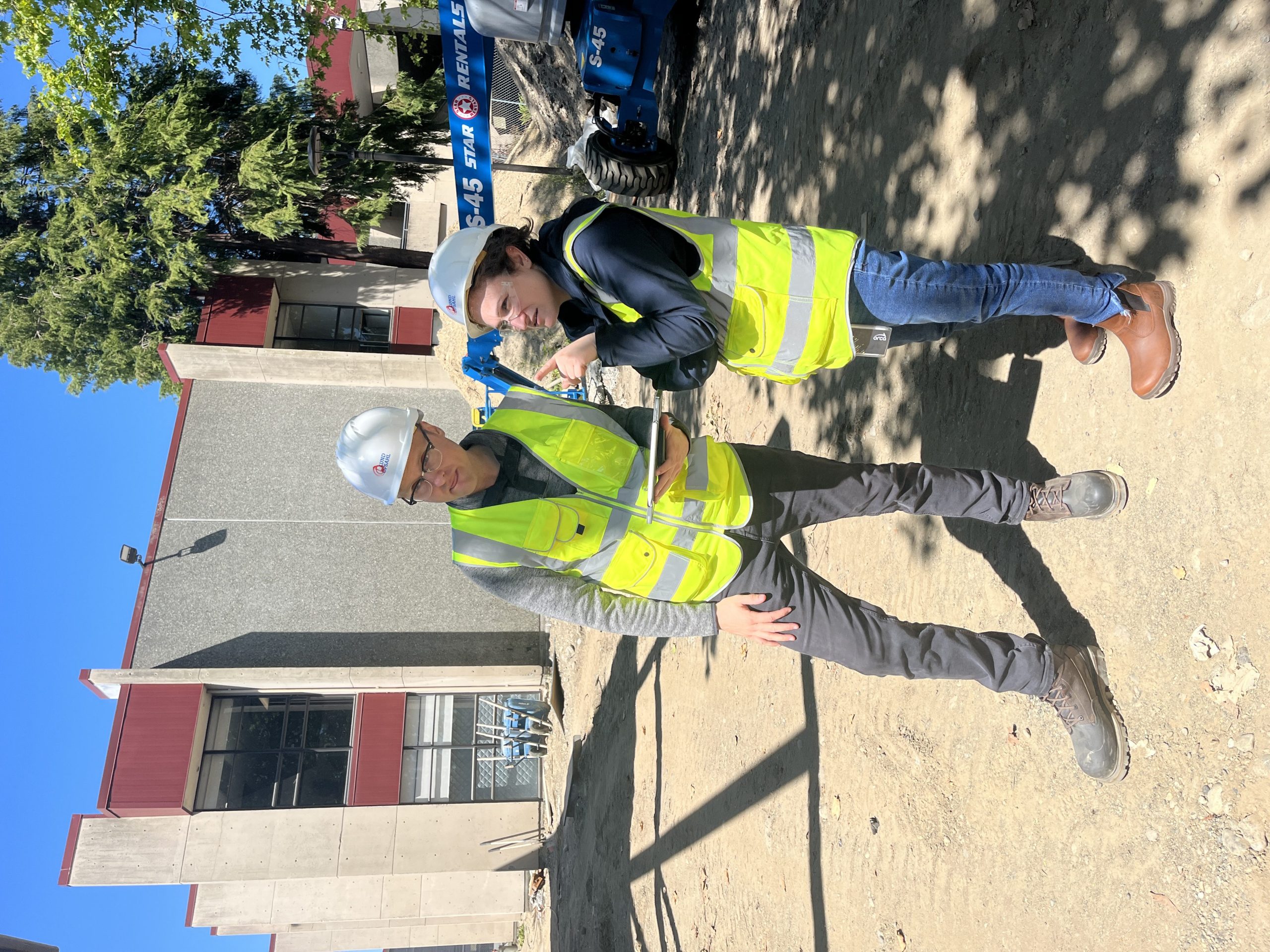 Chris Cattron and Julie Kerline discuss while on site at the construction of the Olympic College Shops.